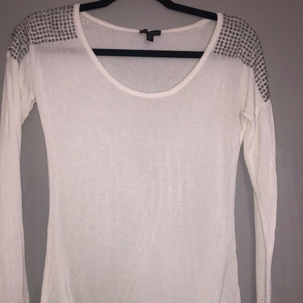 White long sleeve top with shoulder embellishments